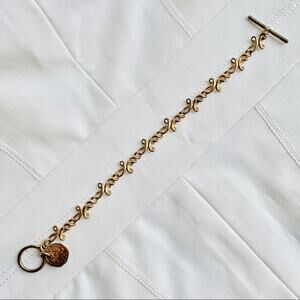 Decorative sun stamp bracelet with T closure